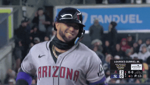a baseball player for the arizona team is smiling during a game