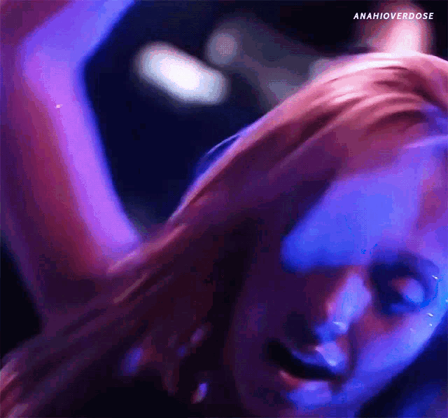 a close up of a woman 's face with the hashtag anahioverdose