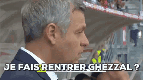 a man in a suit and white shirt says je fais rentrer ghezzal