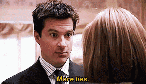 a man in a suit and tie is talking to a woman and the woman is saying more lies .