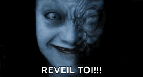 a close up of a scary face with the words `` reveal to ! ''