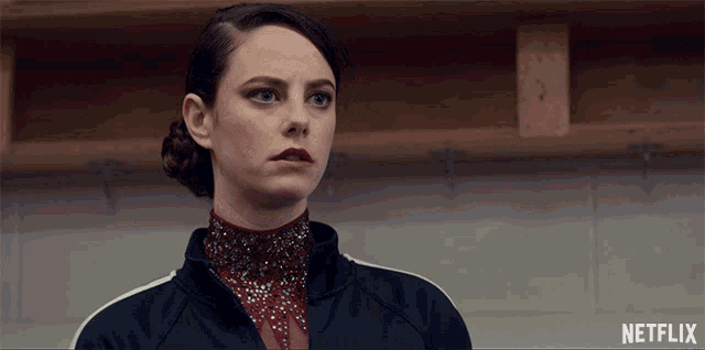 a woman in a locker room with netflix written on the bottom