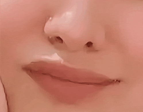 a close up of a person 's mouth with their teeth visible