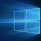 the windows logo is glowing brightly in the dark .