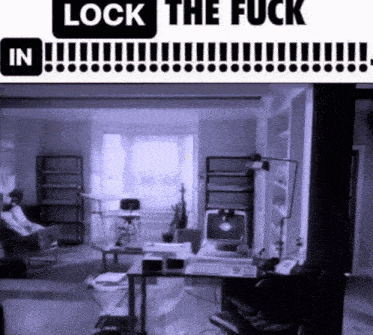 a black and white photo of a living room with the words lock the fuck in