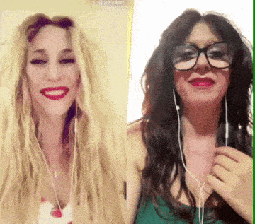 a woman wearing glasses and earbuds is smiling next to another woman wearing glasses and earbuds