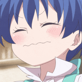 a girl with blue hair making a funny face with her eyes closed