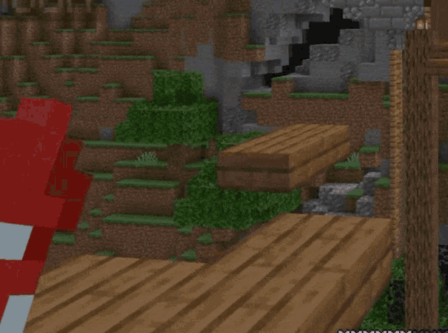a minecraft screenshot with a blue cube in front of a statue