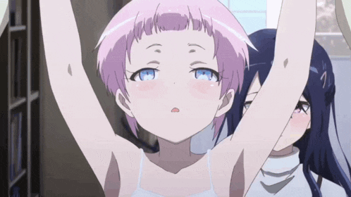a girl with pink hair and blue eyes has her arms up in the air
