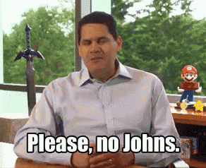 a man is sitting at a desk with his eyes closed and says please no johns .