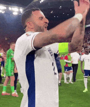 a man in a white shirt with the number 7 on the back