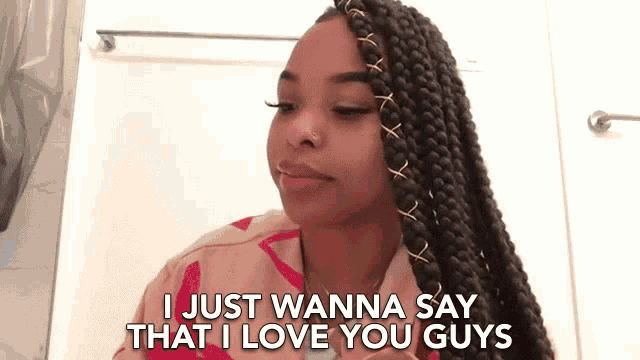 a girl with braids says i just wanna say that i love you guys