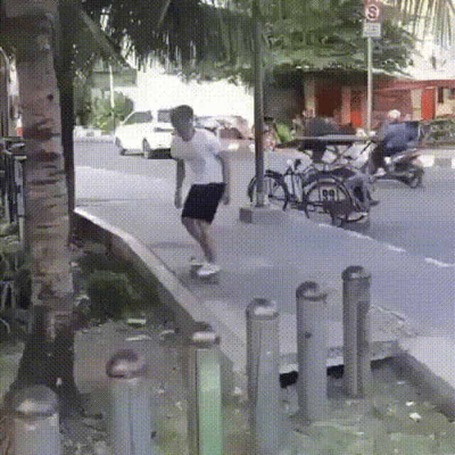 a man is riding a skateboard down a street with a sign that says no parking