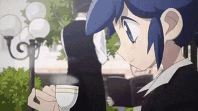 a young girl with blue hair is drinking a cup of coffee .