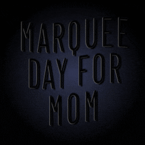 neon sign that says marquee day for mom on it