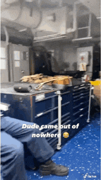 a man sits in a room with the words dude came out of nowhere above him