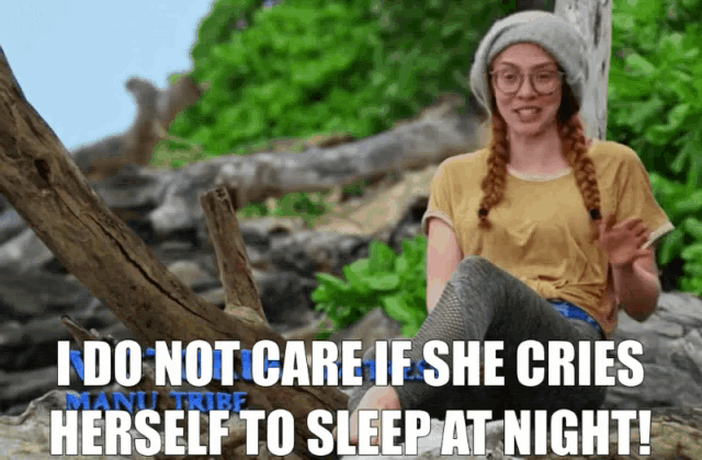 a woman sitting on a rock with the words " i do not care if she cries herself to sleep at night " below her