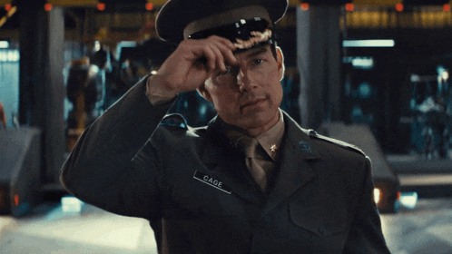 a man in a military uniform has the name cage on his uniform