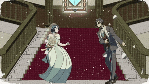 a bride and groom are standing on a red carpet on a staircase
