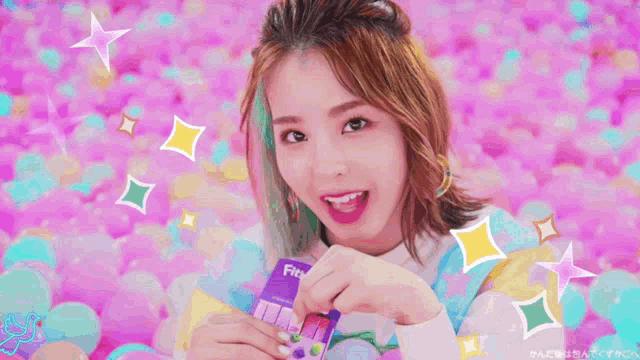 a girl is holding a card that says fia