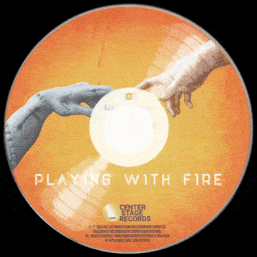 a cd that says playing with fire on the front