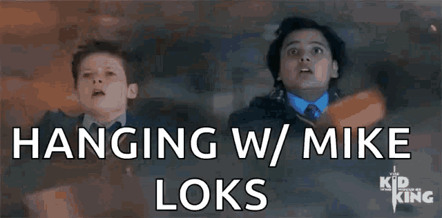 two boys are standing next to each other with the words " hanging w / mike loks " written above them .