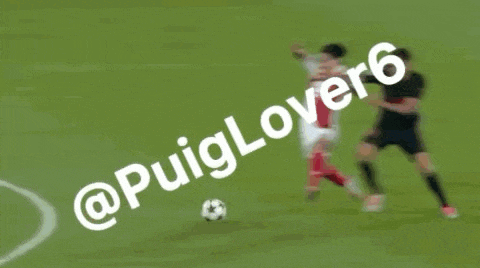 a soccer player with the number 86 on his back is being tackled by another player
