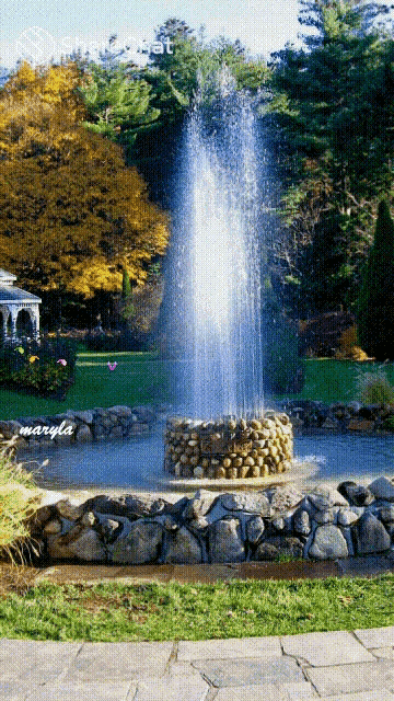 a picture of a fountain with the name maryla on the bottom right