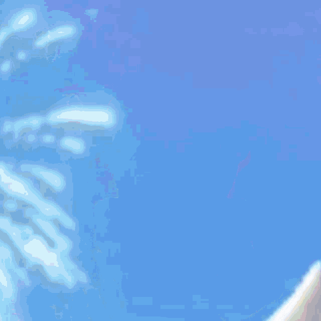 a sticker of a cartoon character wearing sunglasses and a bow tie is flying through the air .