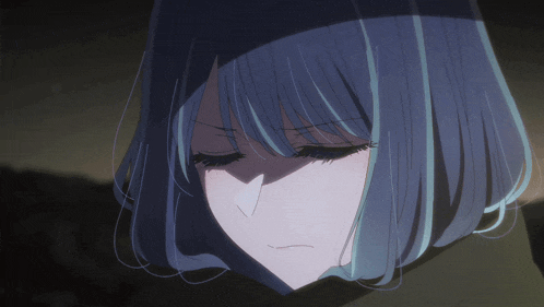 a close up of a girl with blue hair