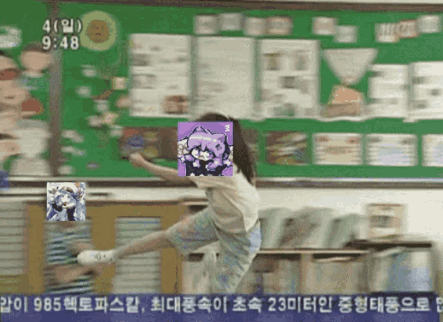 a girl is jumping in the air in front of a bulletin board that says 8:48