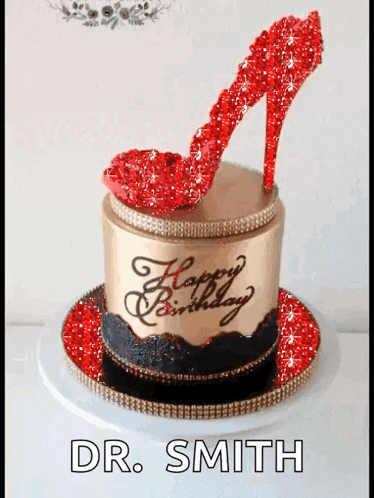 a birthday cake for dr. smith with a red shoe on top of it
