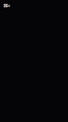 a red snake with green eyes is on a black background .