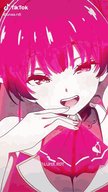 a tiktok video of a girl with pink hair and a white shirt