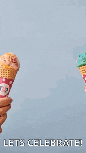 a person is holding two ice cream cones in their hands with the words `` let 's celebrate ! ''