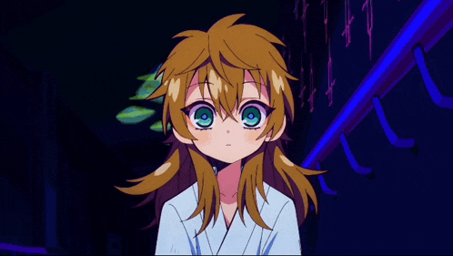 a girl with brown hair and green eyes is looking at the camera