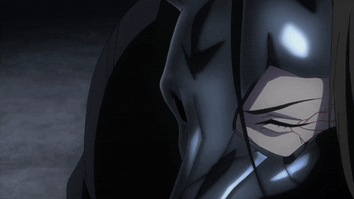 a close up of a person wearing a black mask