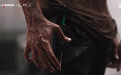 a close up of a person 's hand with the numbers 0902 on it