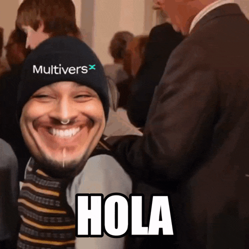 a man wearing a black hat with the word multiverse on it