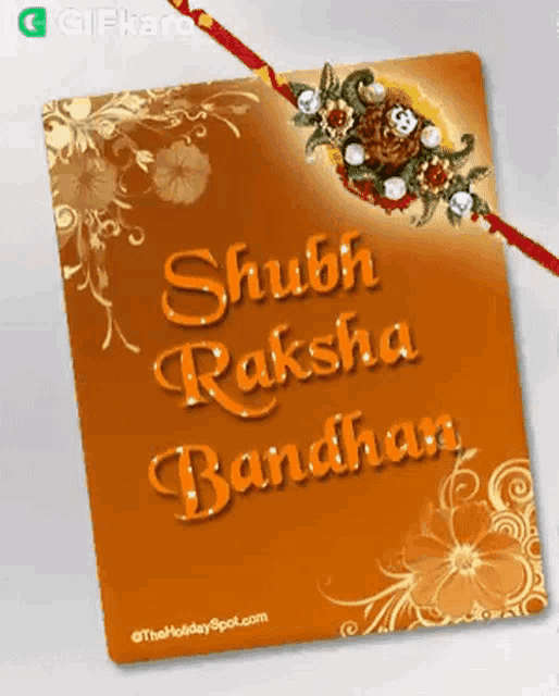 a card that says shubh raksha bandhan with a red ribbon