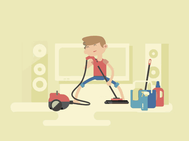 a man is using a vacuum cleaner in front of a television