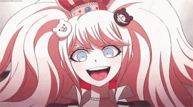 a close up of a cartoon girl wearing a crown and a teddy bear pin on her hair .