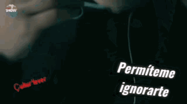 a close up of a man 's face with the words " permiteme ignorarte " written on it