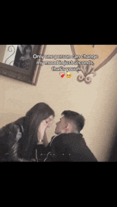 a man and a woman are kissing in front of a mirror with the caption only one person can change my mood in just seconds