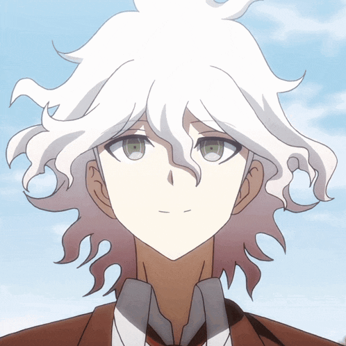 a man with white hair and green eyes is wearing a suit and tie