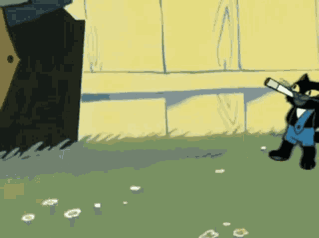 felix the cat is smoking a cigarette in a cartoon .