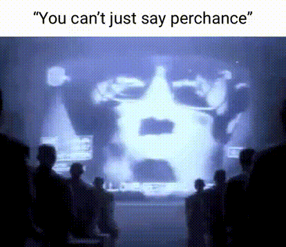 a group of people are watching a projection of a man 's face .