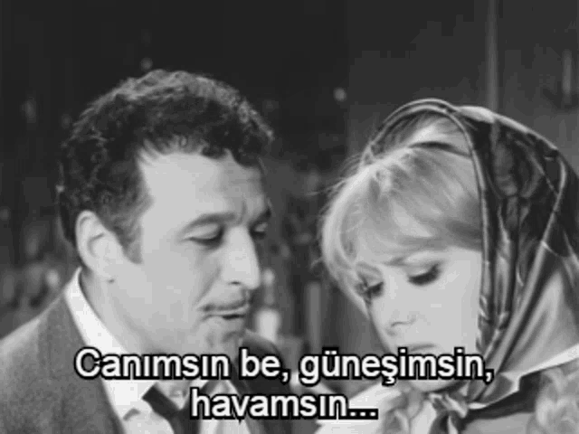 a black and white photo of a man and a woman with the words " canimsin be " above them