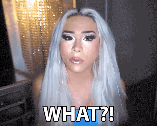 a woman with white hair says what