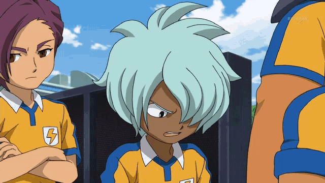 a boy with a lightning bolt on his jersey